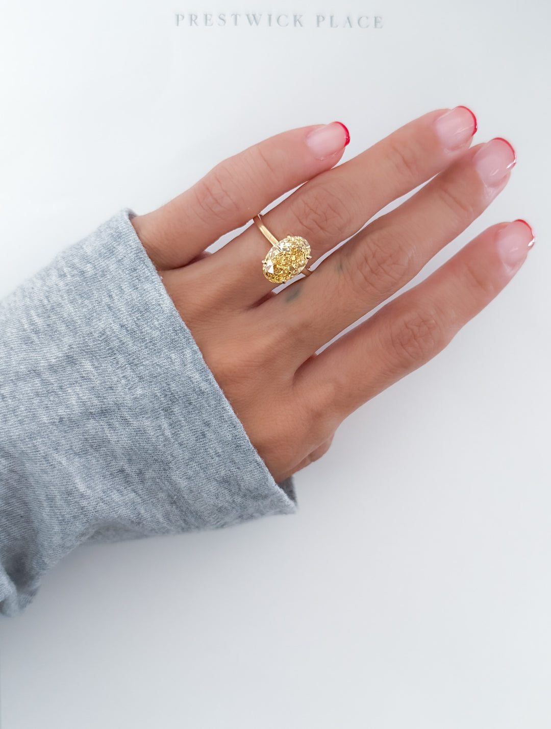 Fancy Vivid Yellow Oval 4.0ct Diamond- VS1