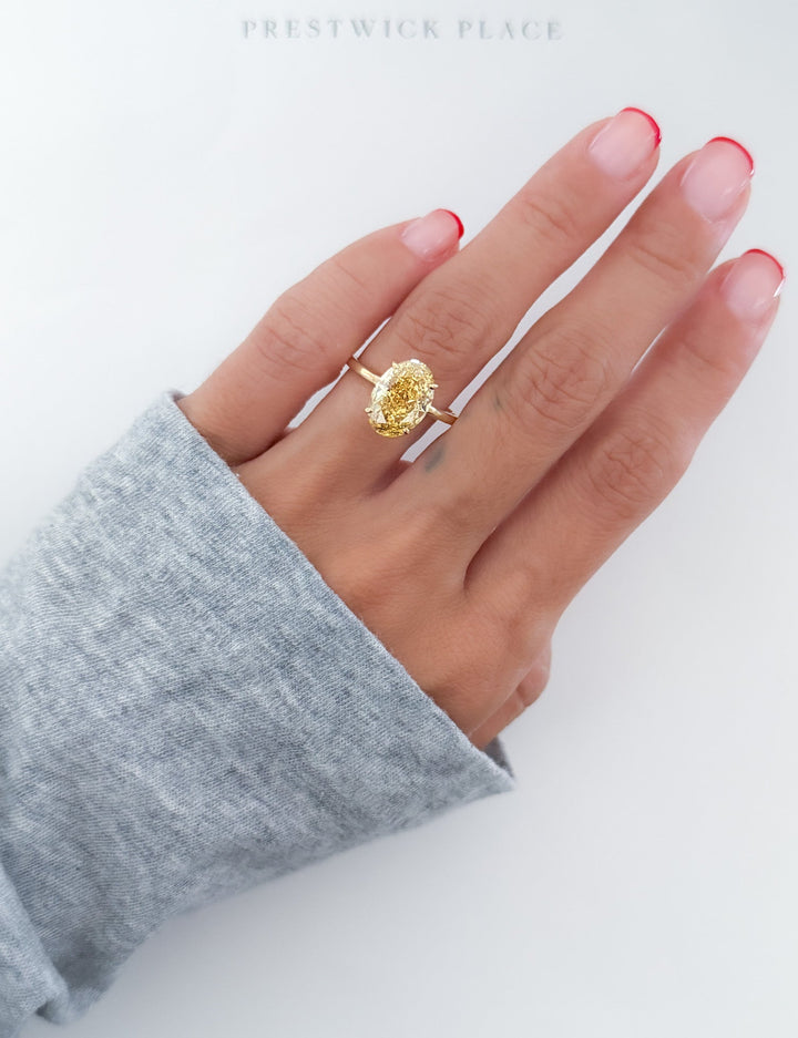 Fancy Vivid Yellow Oval 4.0ct Diamond- VS1