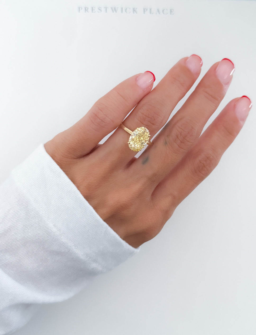 Fancy Vivid Yellow Oval 3.0ct Diamond- VS1