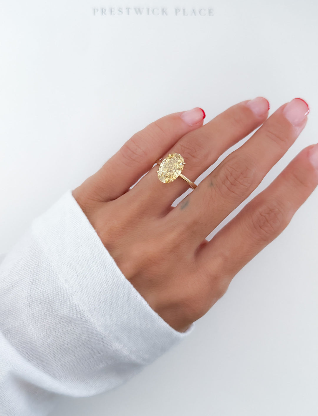 Fancy Vivid Yellow Oval 3.0ct Diamond- VS1